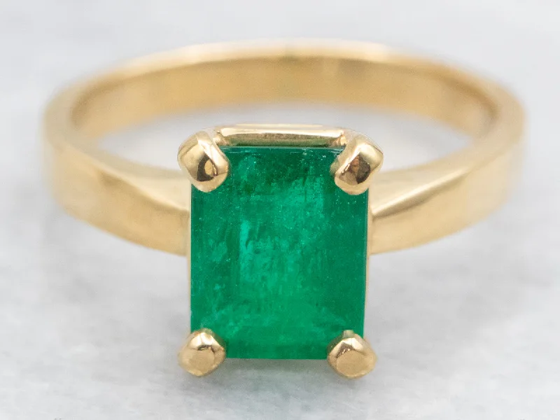 Modern rings for women -Emerald Solitaire Ring in 18-Karat Yellow Gold