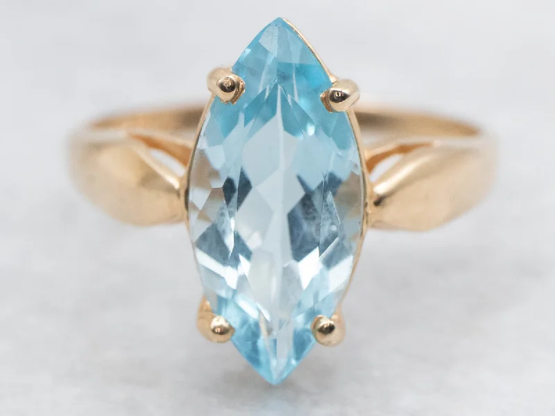 Unique gemstone rings for women -Marquise Blue Topaz Solitaire Ring in Yellow Gold Setting