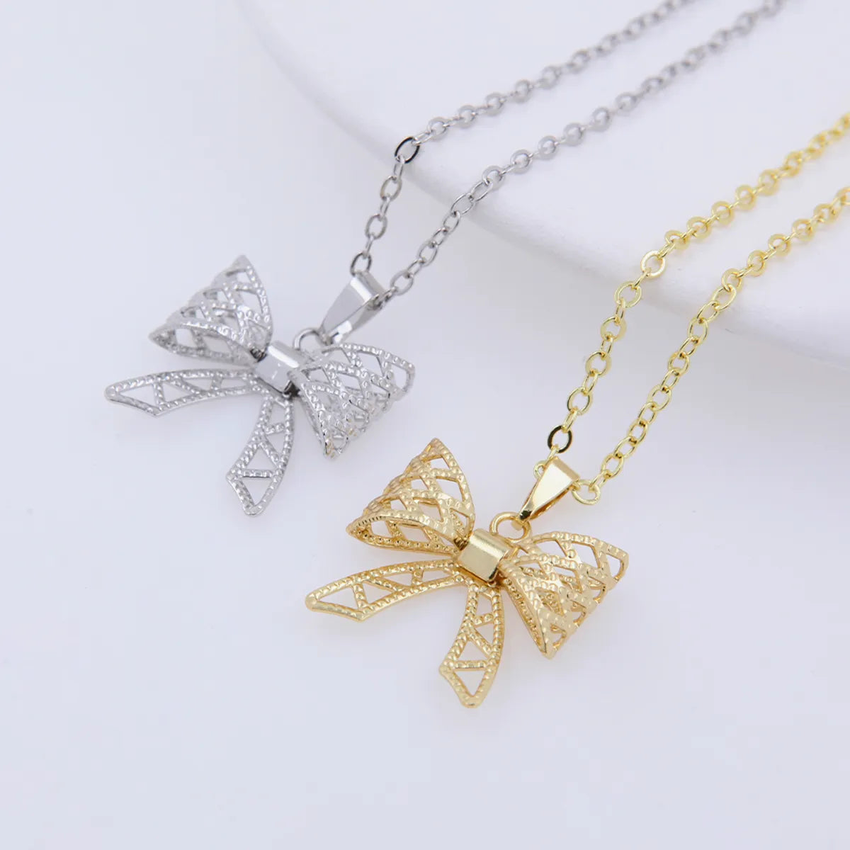 Bridal pearl necklaces for women -Copper 18K Gold Plated White Gold Plated Simple Style Plating Bow Knot Pendant Necklace