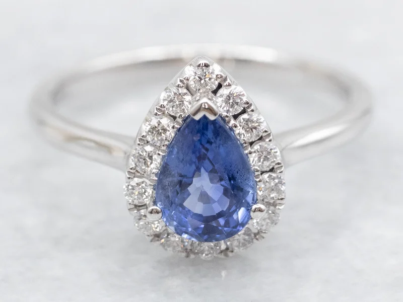 Fashionable rings for women -Modern Pear Cut Sapphire Diamond Halo Ring