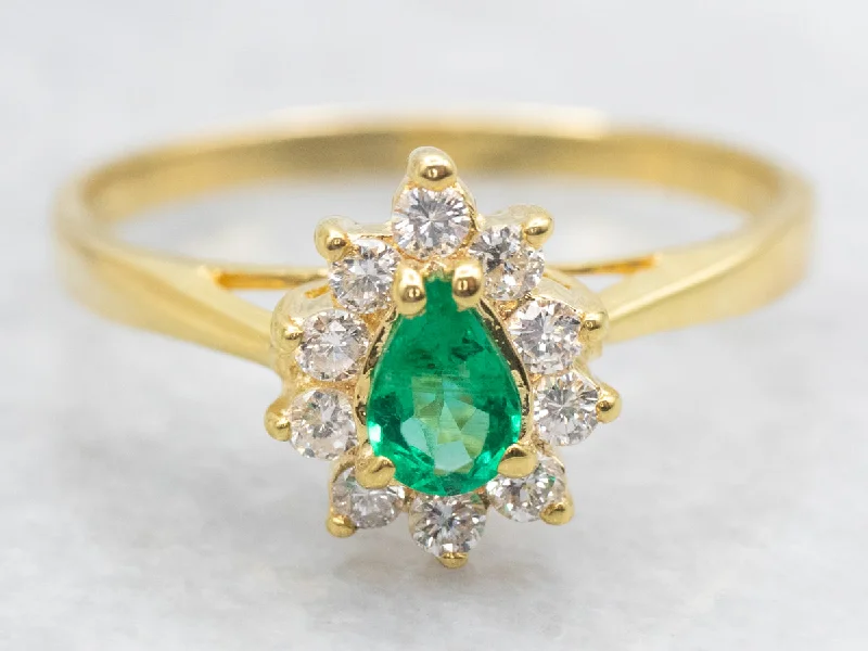 Fashion rings for women -Modern Pear Cut Emerald and Diamond Halo Ring