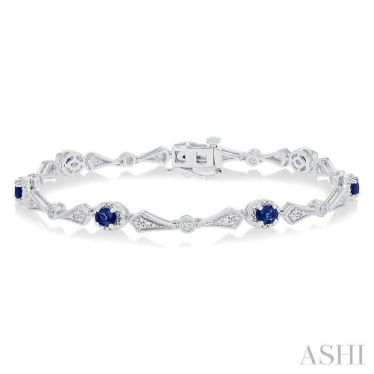 Personalized bracelets for women -1/10 ctw Oval Cut 4X3MM Sapphire and Round Cut Diamond Precious Bracelet in 10K White Gold