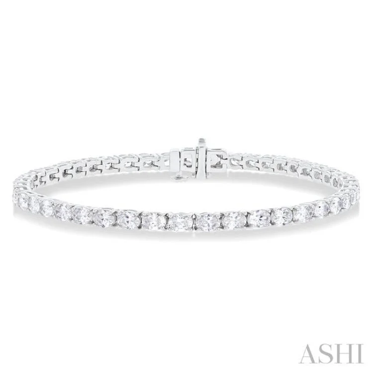 Heart bracelets for women -5 1/2 ctw East West Oval Cut Diamond Fashion Tennis bracelet in 14K White Gold